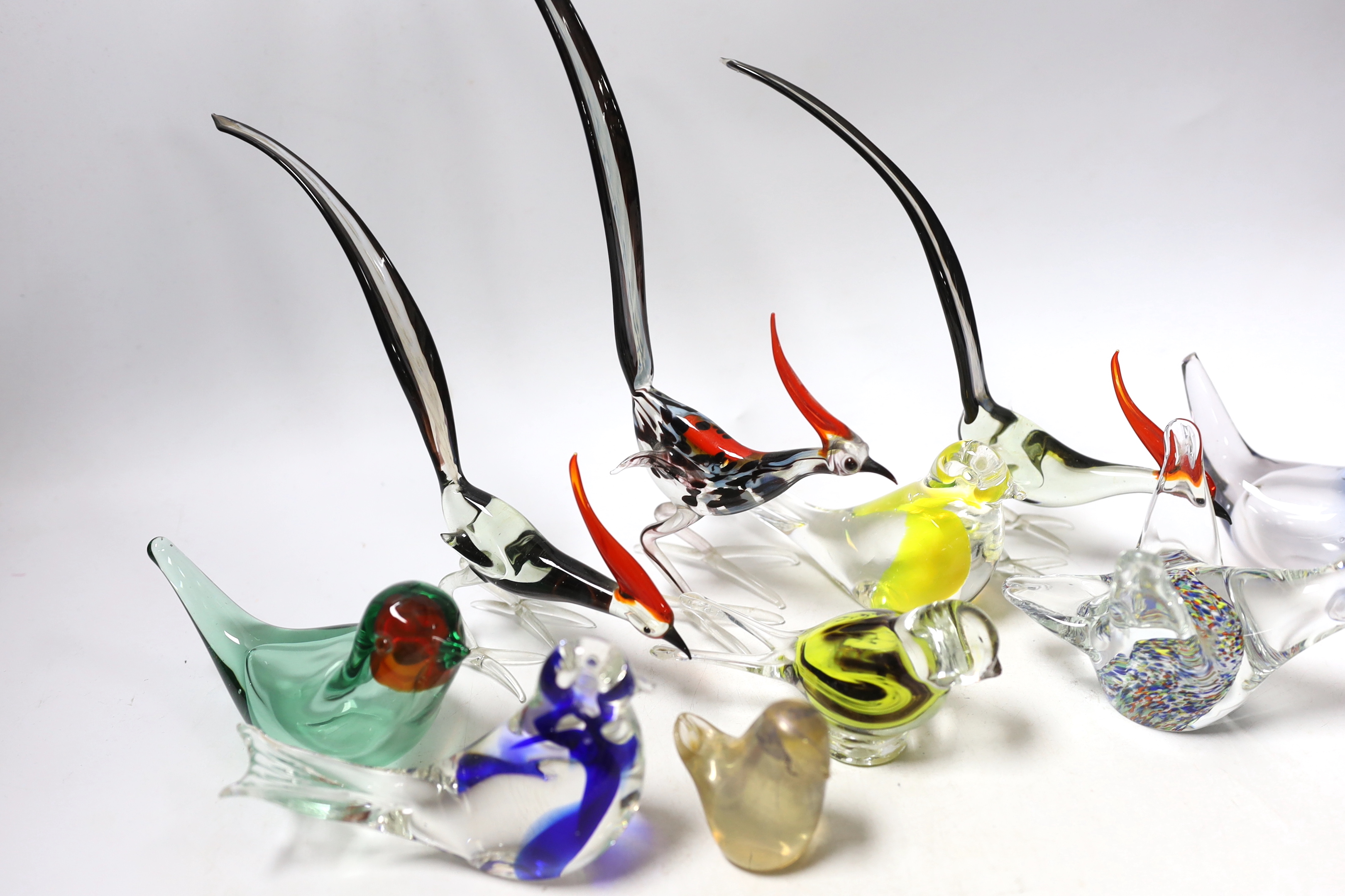 Ten Continental glass models of birds, some in the form of paperweights, tallest 26cm (to end of tail)